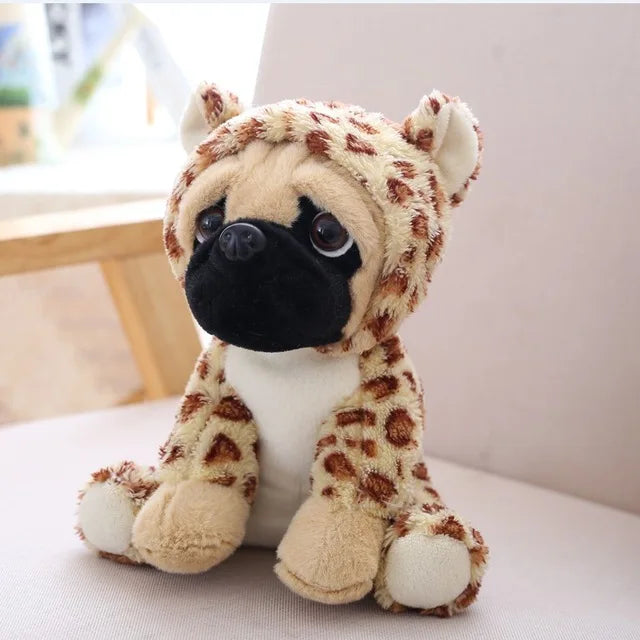 Plush toy with a pug face and leopard print body on a light-colored surface.