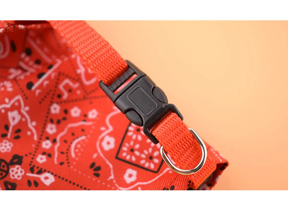 Red bandana with black patterns and a black buckle on an orange background