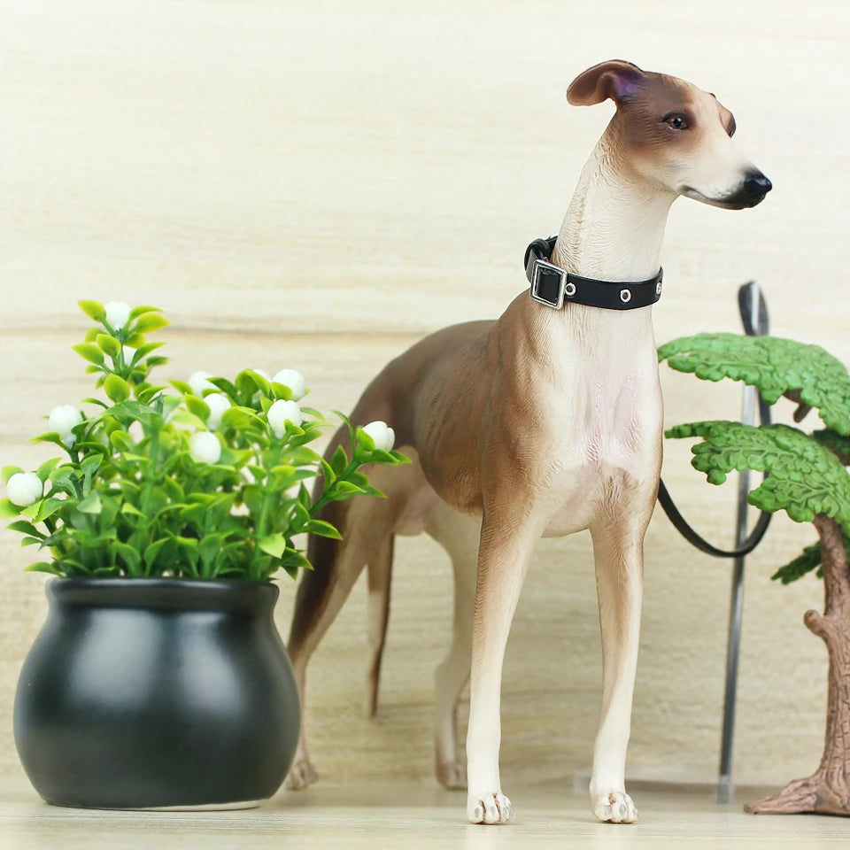 Dog standing next to a potted plant indoors