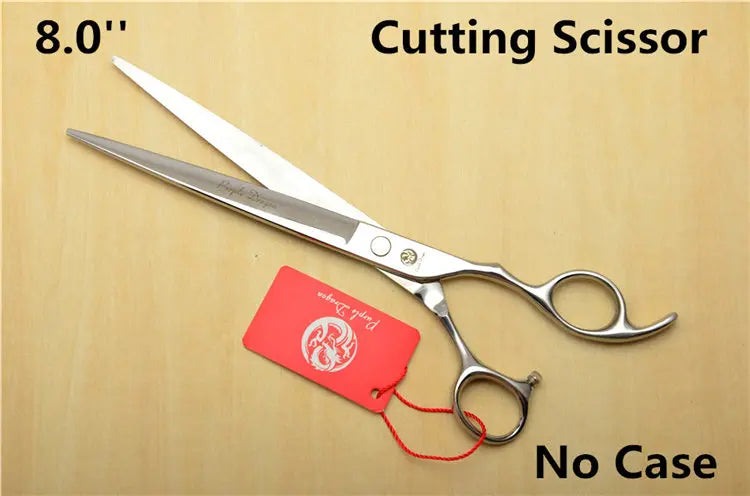 8.0 inch cutting scissors with a red tag on a wooden background
