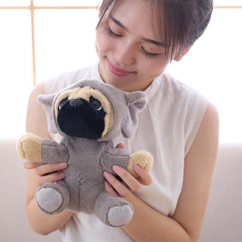 Woman holding a plush pug toy against a light background