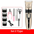 Pet grooming tool set with a gold clipper, attachments, and tools on a white background.