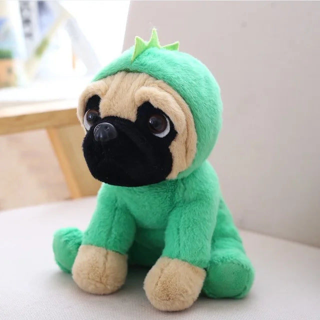 Green plush toy resembling a pug on a light-colored surface.