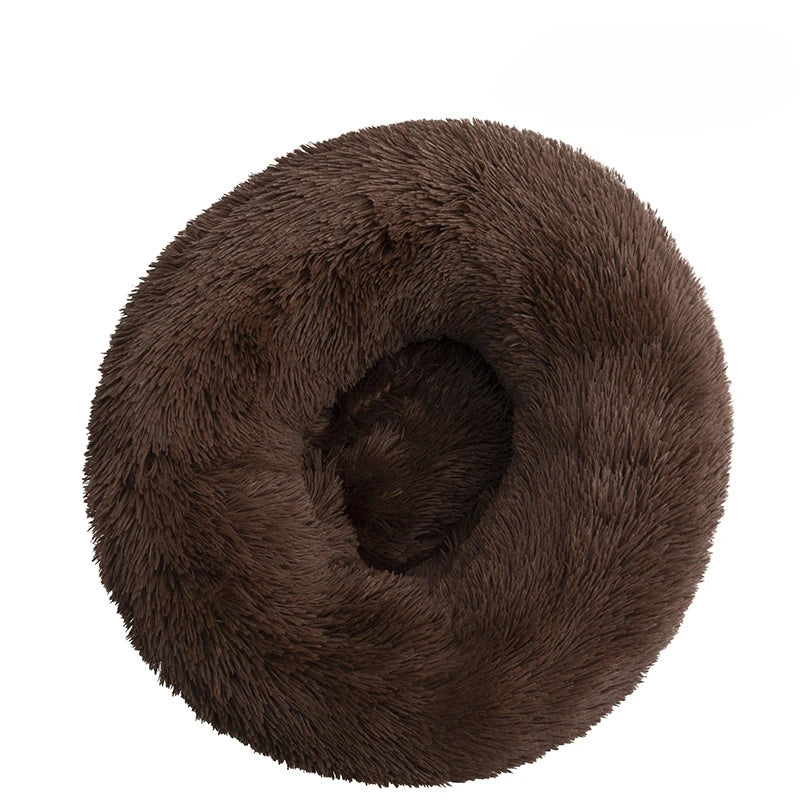 Brown fluffy donut-shaped cushion on a white background