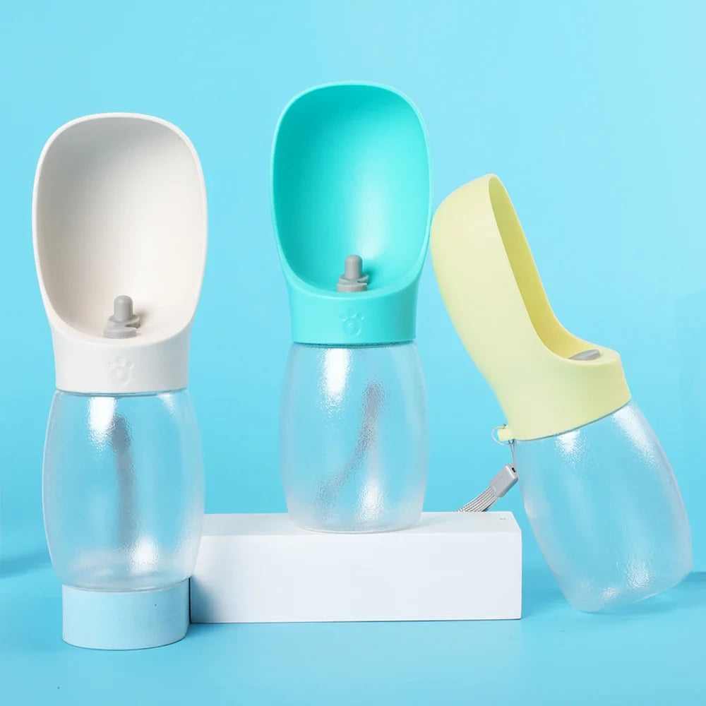 Three colorful pet water bottles on a blue background