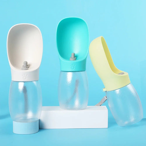 Three colorful pet water bottles on a blue background