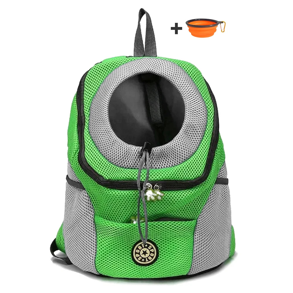 Green pet carrier backpack with a small orange bowl on a white background