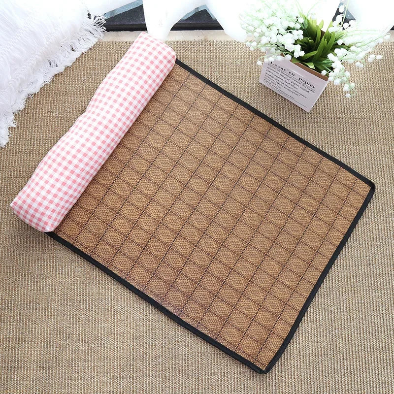 Brown textured mat with a pink checkered roll on a beige surface