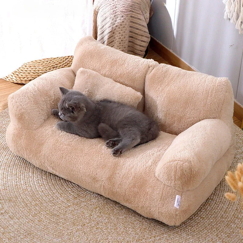 Cat lying on a plush beige pet bed in a cozy room.
