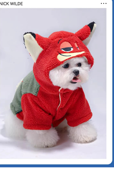 Dog wearing a red fox costume on a white background