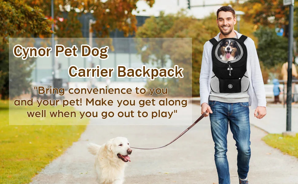 Man walking a dog with a Cynor Pet Dog Carrier Backpack on a path in a park.