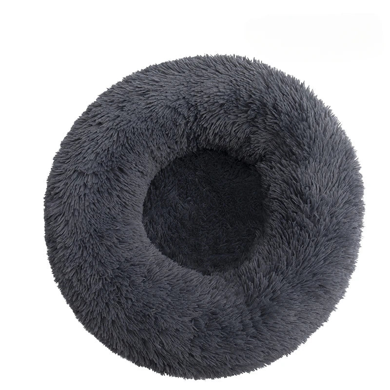 Fluffy dark gray pet bed on a white background