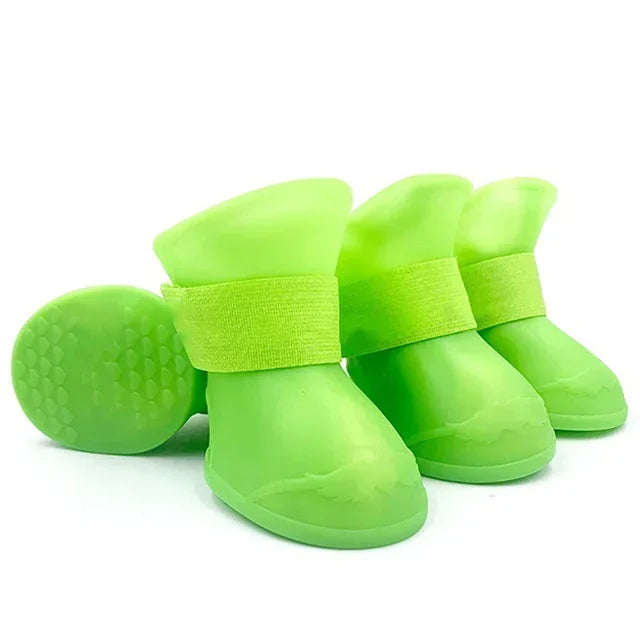 Green pet boots with branding on a white background