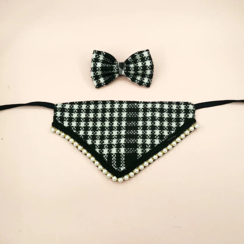 Black and white checkered dog bandana with pearl trim and matching bow tie on a beige background