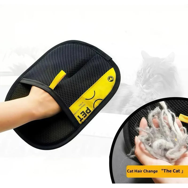 Black pet hair removal mitt with yellow label on a white background