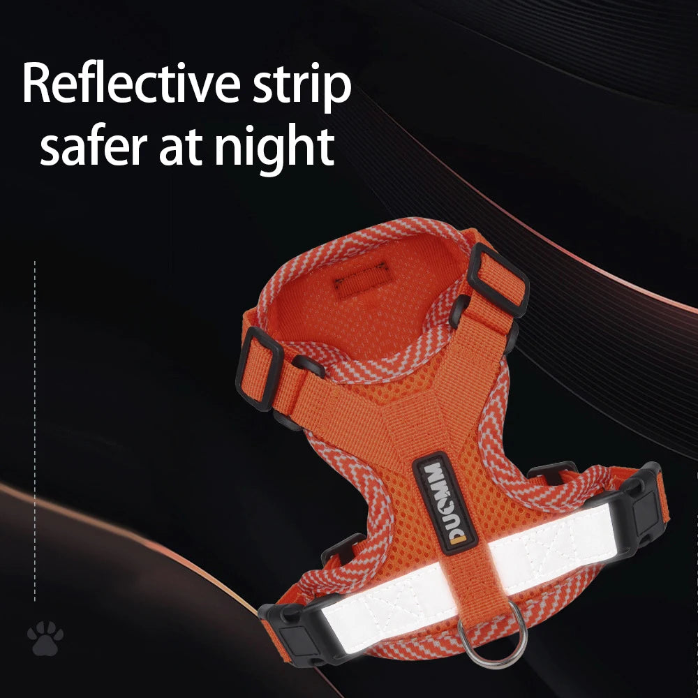 Orange dog harness with reflective strip on a black background
