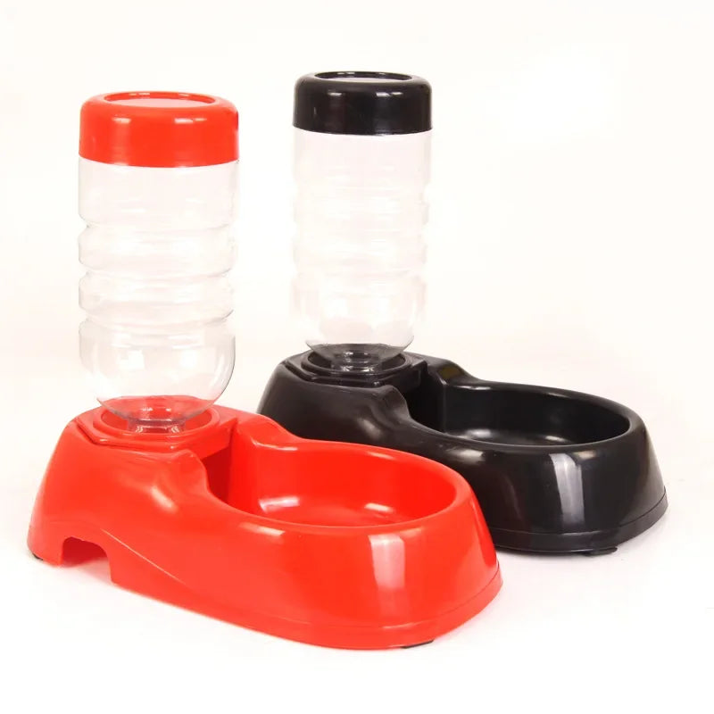 Red and black pet water and food bowl set on a white background