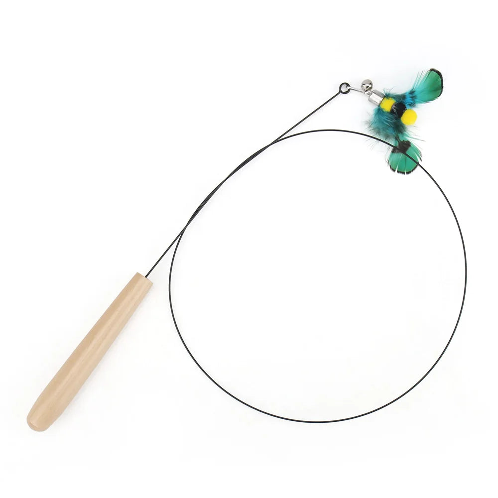 Cat toy with a wooden handle and colorful feathers on a white background