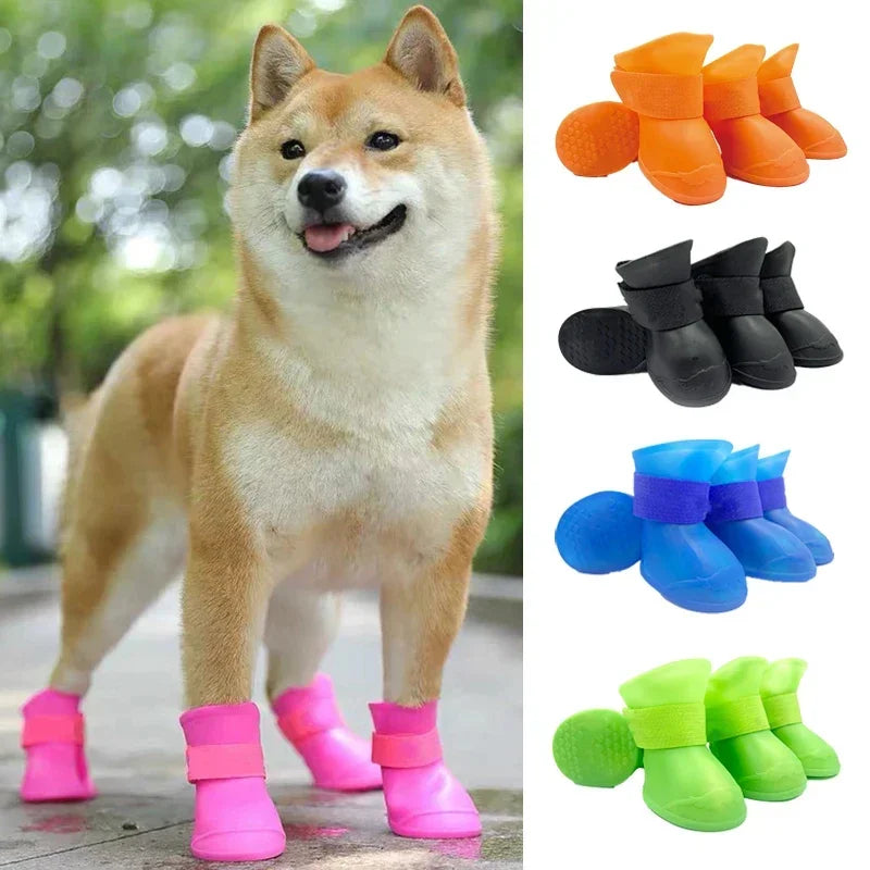 Dog wearing pink rain boots with colorful booties displayed on a white background