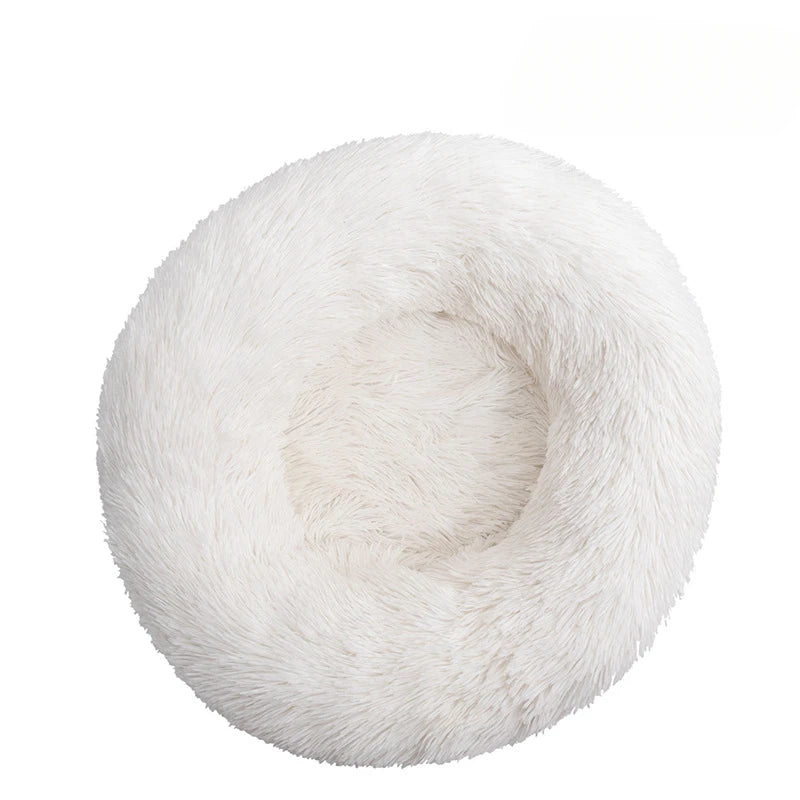 White fluffy pet bed on a white background