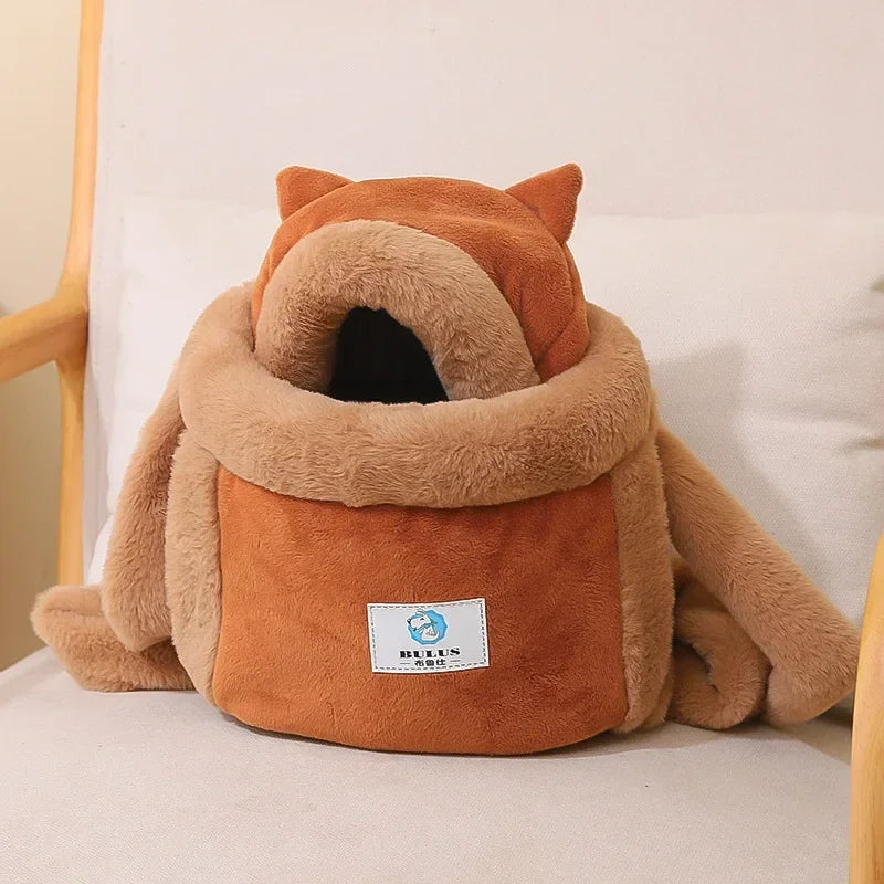 Fox-shaped pet bed with a visible brand label on a light background