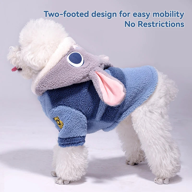 Dog wearing a blue and gray costume with text about mobility