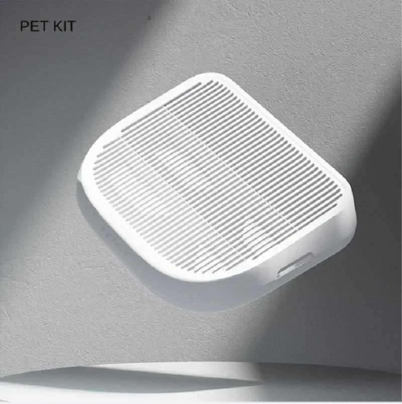 White pet mat on a gray surface with 'PET KIT' text above.