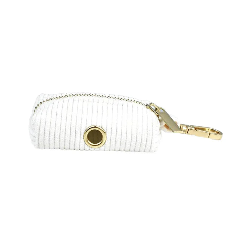 White bag with  gold clasp on a white background
