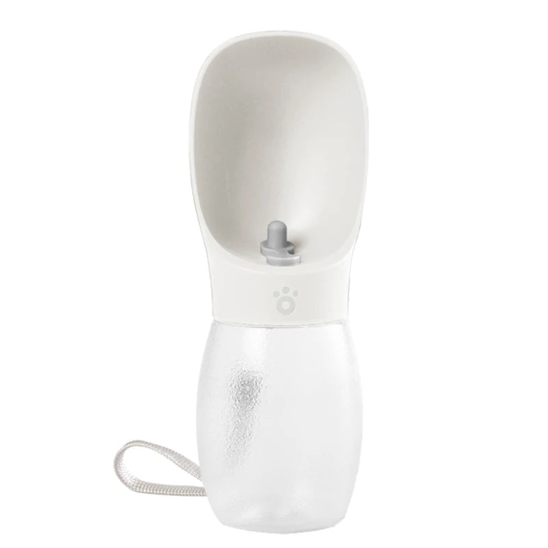 White pet water bottle with scoop on a white background