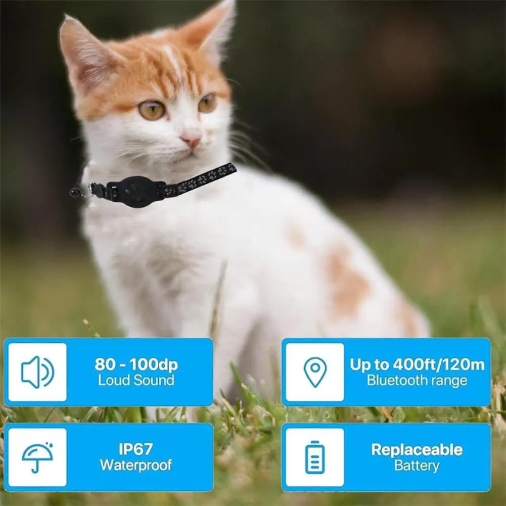 Cat wearing a black collar with product features displayed on a grassy background