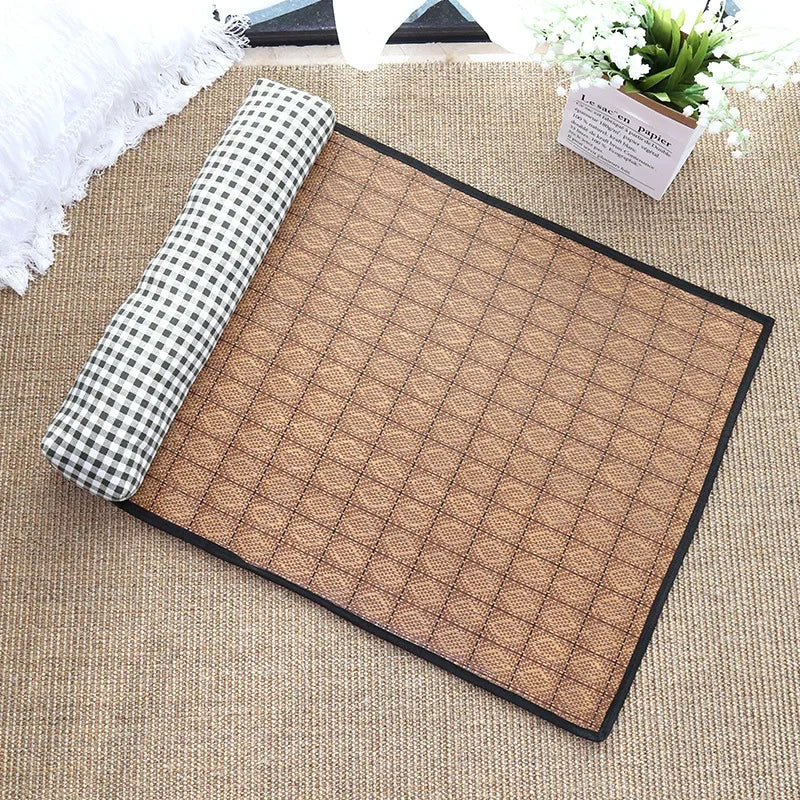 Brown textured mat with a checkered pillow on a beige surface