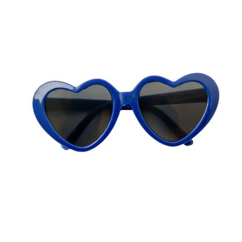 Heart-shaped sunglasses with blue frame and dark lenses on a white background