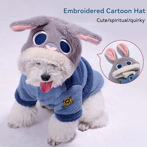 Dog wearing a blue outfit with cartoon hat on a white background