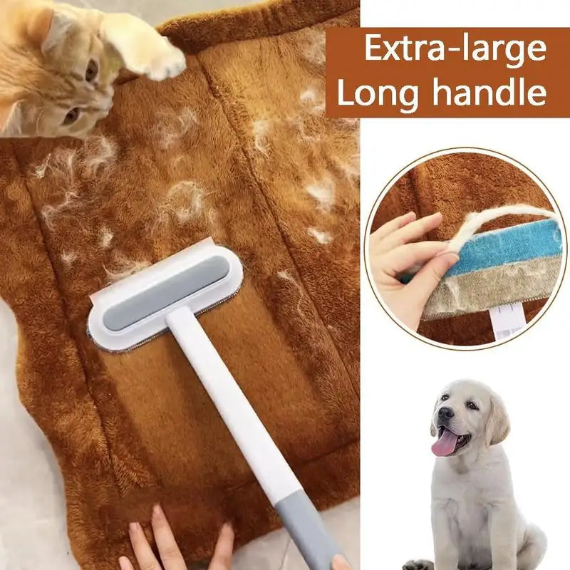 Pet hair removal brush with a long handle being used on a brown surface, with a dog and cat shown for scale.