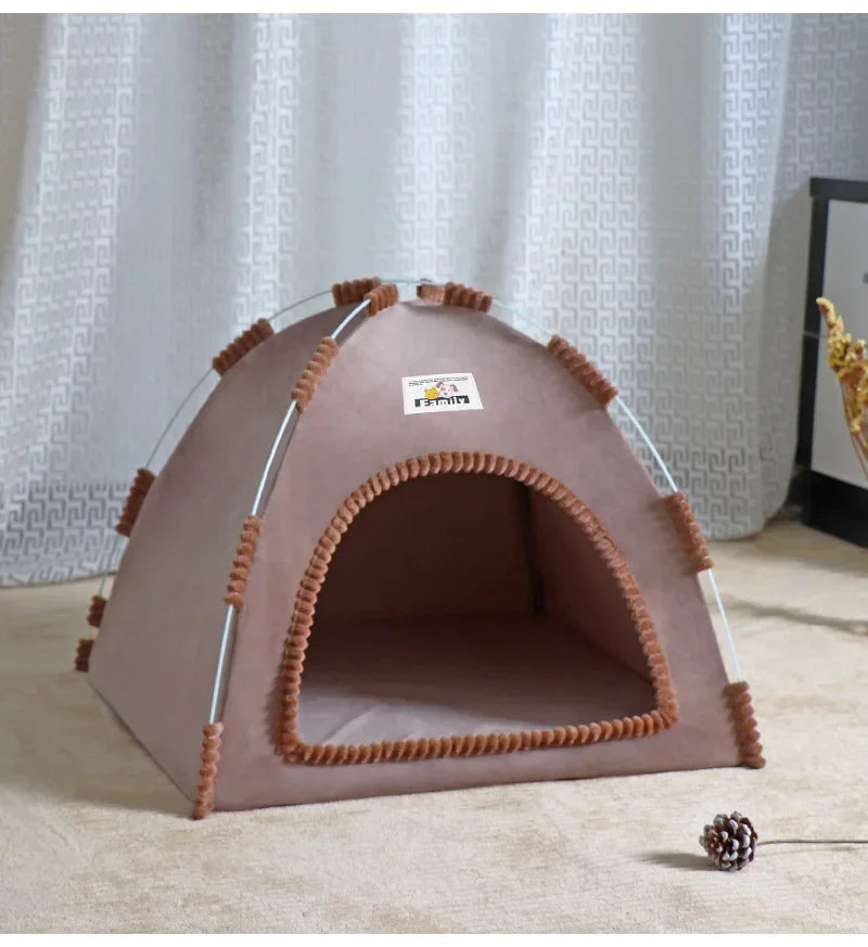 Brown pet tent with brown trim on a light  tan carpet