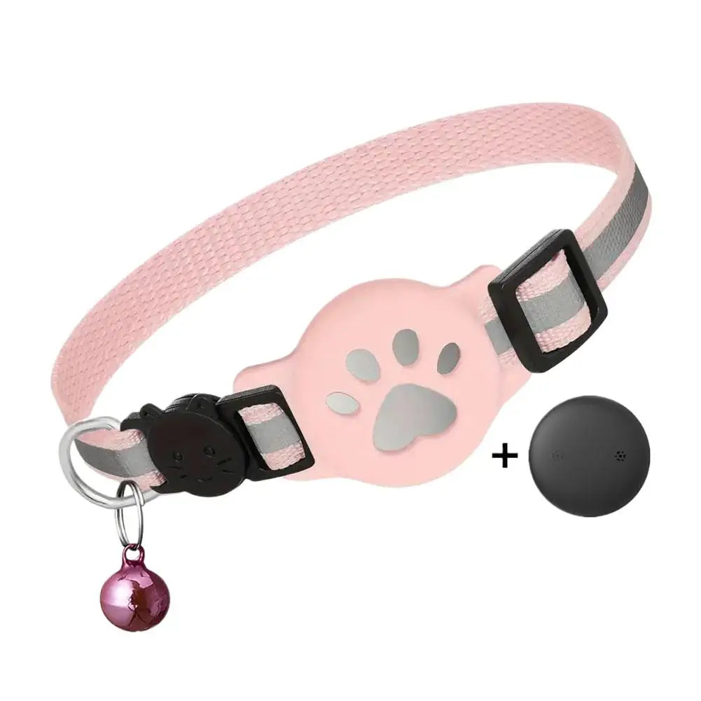 Pink cat collar with paw design, bell, and black clip on a white background