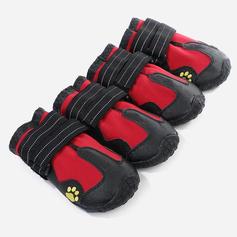 Red and black pet boots with paw design on a white background