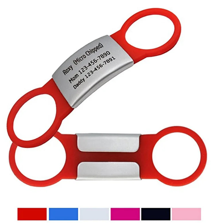 Red and silver pet identification scissors on a white background