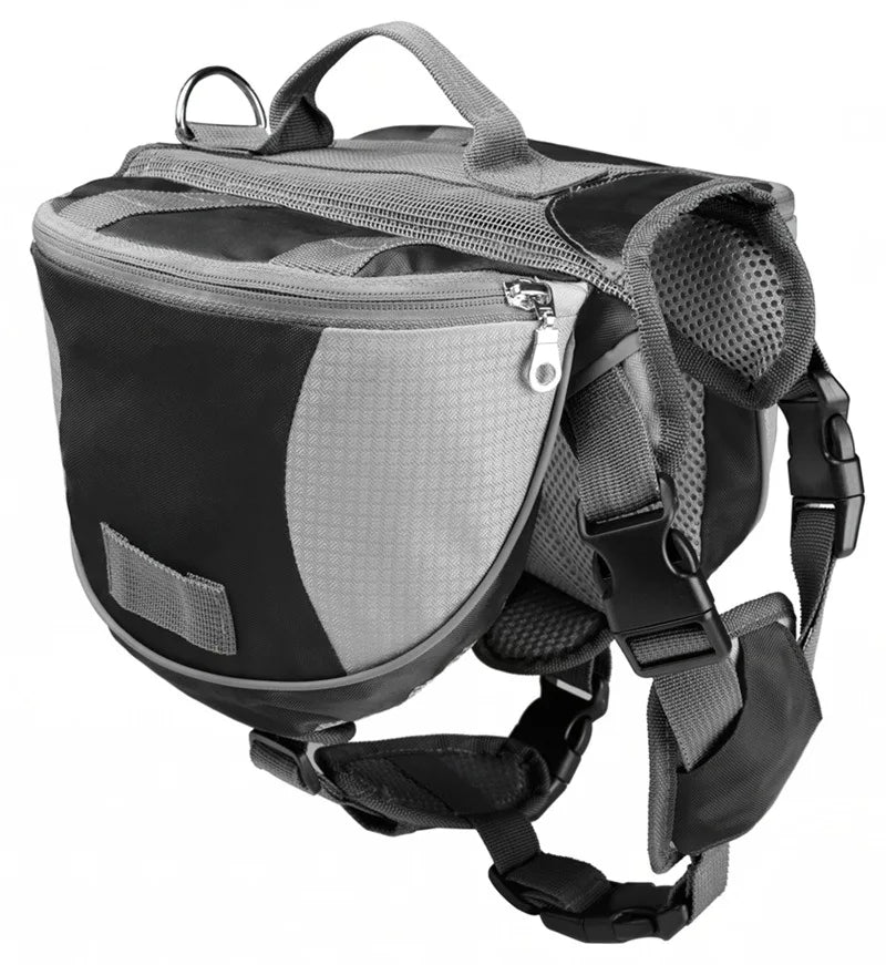Black and gray dog harness with side bags on a white background
