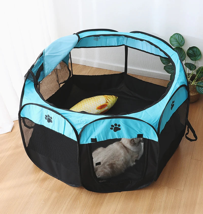 Pet playpen with a dog inside on a wooden floor