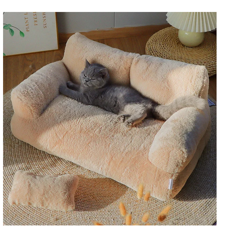 Cat lounging on a plush beige pet bed with a soft texture.
